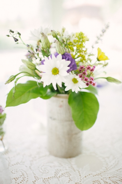 Daisies and wildflowers.  Wedding table centerpiece.  