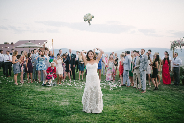 bride tossing bouquet